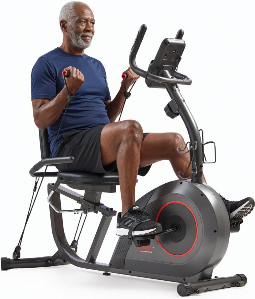 an elderly man excersing with a recumbent bike